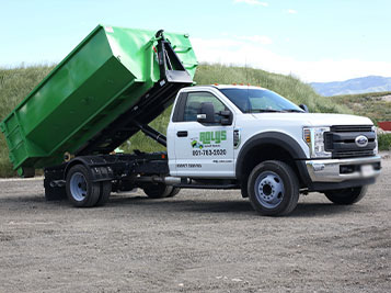Dumpster Delivery Truck